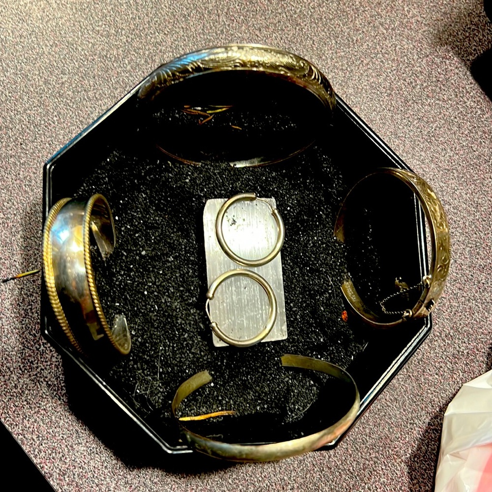 4 sterling silver bracelets with silver earrings.